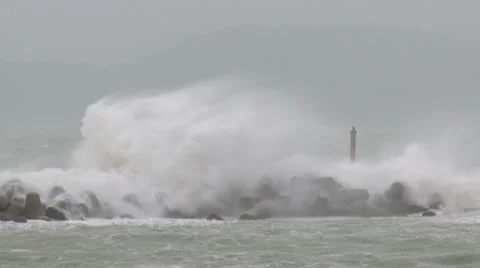 Large Waves Hit Seawall During Hurricane Stock Footage