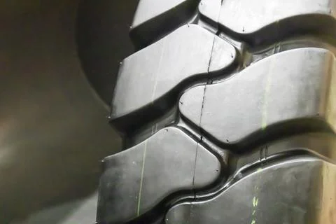 Large wheel tire tread pattern for excavator tires Stock Photos