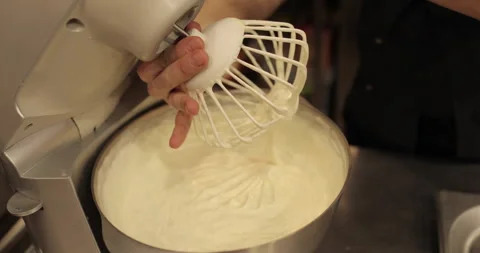 A large whisk of a professional blender in the hand Stock Footage 248966537
