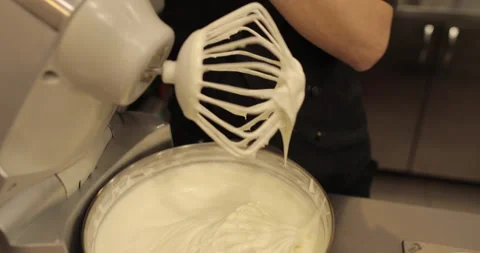 A large whisk of a professional blender in the hand Stock Footage 248966960