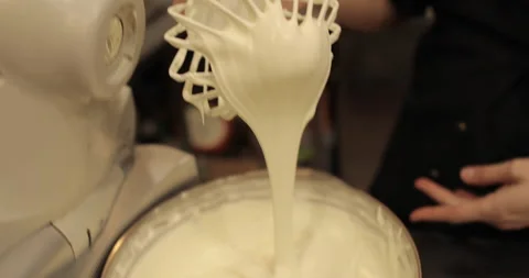 A large whisk of a professional blender in the hand Stock Footage 248967296