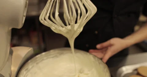 A large whisk of a professional blender in the hand Stock Footage 248967697
