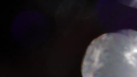 Large white and blue sparkling bokeh light leak Stock-Footage 318363795
