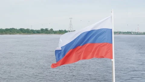 Large white blue red flag waved by wind on ship stern Stock Footage 155286481