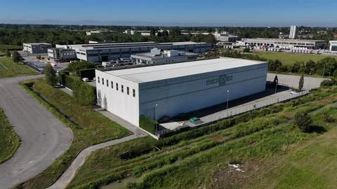 Large white building of MicroData Group, specializing in digital management.. Stock Photos
