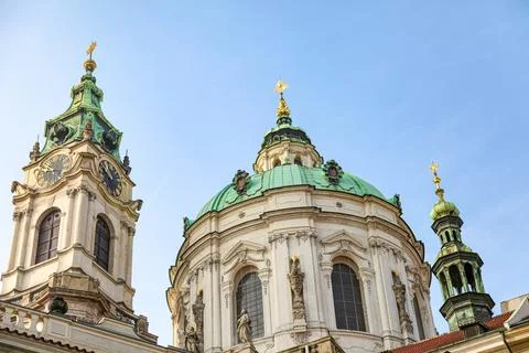 A large white building Prague Czech Republic with a green dome and two cloc.. Stock Photos
