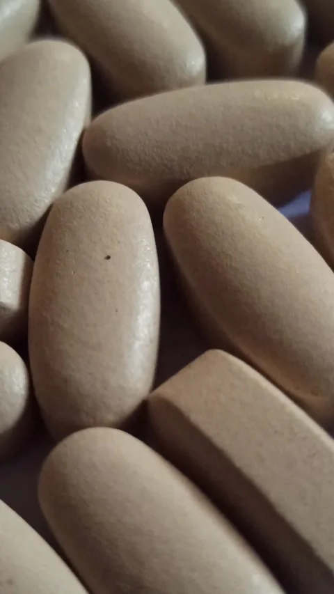 Large White Capsule Pill Video stock 255037799