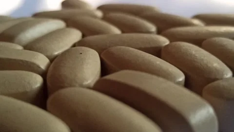 Large White Capsule Pill Video stock 255037875