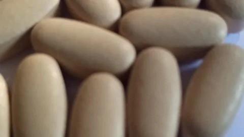 Large White Capsule Pill Video stock 255037934