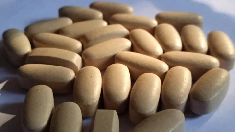 Large White Capsule Pill Video stock 255038044