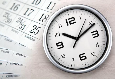 Large white clock face with calendar sheets Stock Photos