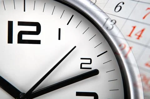 Large white clock face with calendar sheets Foto stock