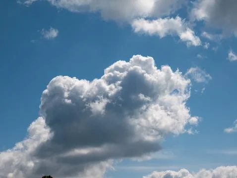 Large White Cloud Against Blue Sky 写真素材