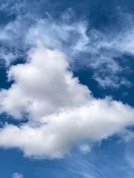 Large White Cloud Against Blue Sky Background Stock Photos