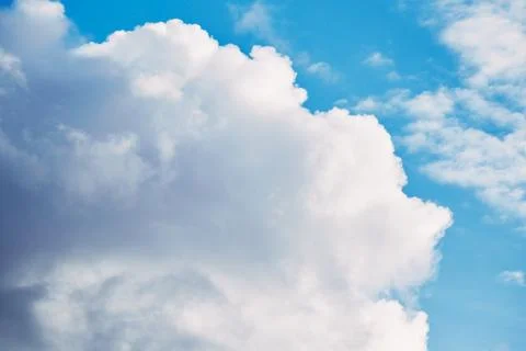 A large white cloud in the blue sky Stock Photos