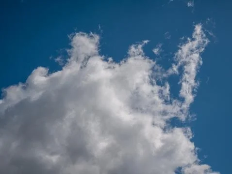 Large white cloud in blue sky 写真素材