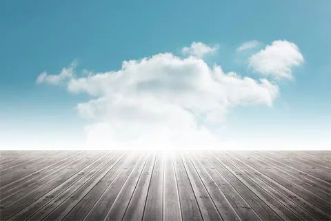 Large white cloud floating in blue sky above wooden deck in flat design, with Stock Photos