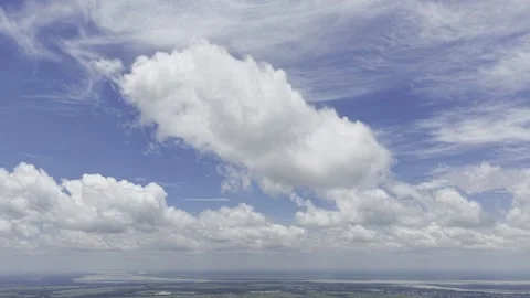 Large White Cloud Stretching Over Distant Countryside Stock Footage 344271522