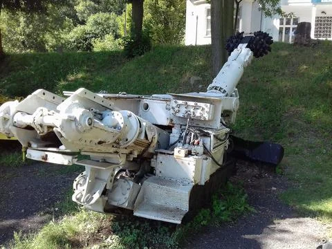 Large white coal mining machine in Landek outdoor museum of mining. Stock Photos