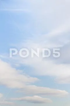 Large white Cumulus clouds on blue sky Stock Photos
