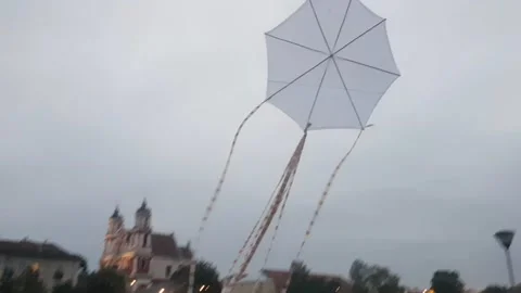 A large white kite rises into the sky Stock Footage 167517200