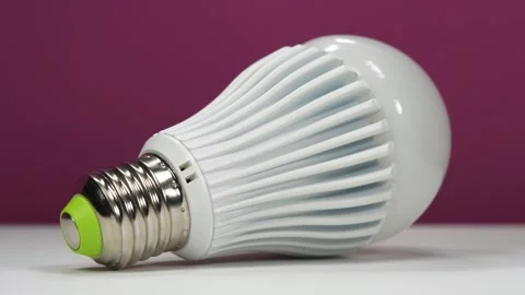 Large white LED lamp on a dark pink background Stock Footage 331102100