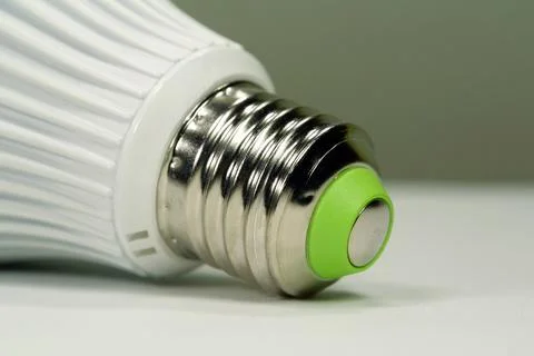 Large white LED lamp with E27 base, close-up shot Stock Photos