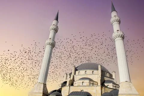 A large white mosque with two minarets. islamic architecture Stock Photos