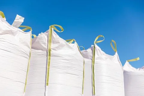 Large White Polypropylene Bulk Sacks With Yellow Lifting Loops Outdoors Stock Photos