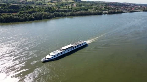 Large white ship sailing on a lake captured from the air Stock Footage 269540138