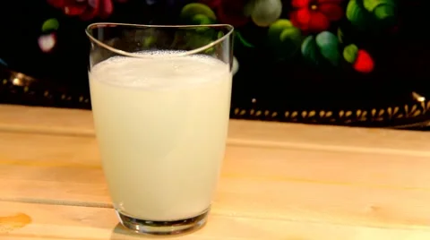 Large white tablet dissolved in a glass of water with a spoon Stock Footage 47074622