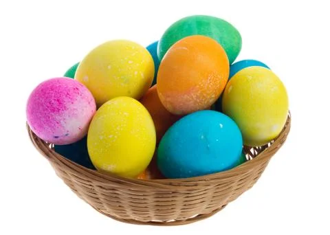 Large wicker basker of colorful easter eggs Stock-Fotos