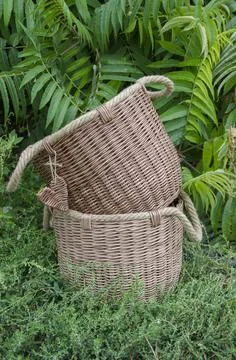 Large wicker baskets in nature. Stock Photos