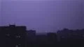 Large wide lightning bolt strikes night city, sounds of rain and thunder HD Footage