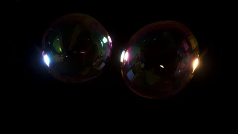Large wiggly bubbles shot in studio at 250 fps slow motion Video stock 77134424