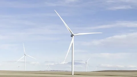 Large Wind Turbine Rotating on Open Landscape with Blue Sky. Stock Footage 329249780