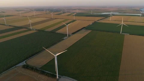 Large wind turbines with blades in field, aerial view. Video stock 149258917