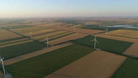Large wind turbines with blades in field, aerial view. Video stock 149259011