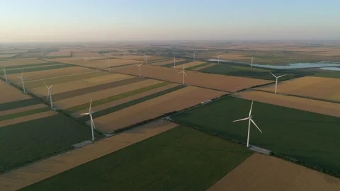 Large wind turbines with blades in field, aerial view. Video stock 149259041