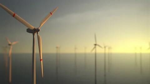 Large wind turbines with blades in field aerial view bright orange sunset blue s Stock Footage 205428997