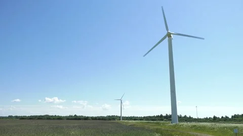 Large wind turbines in the field Stock Footage 155271109
