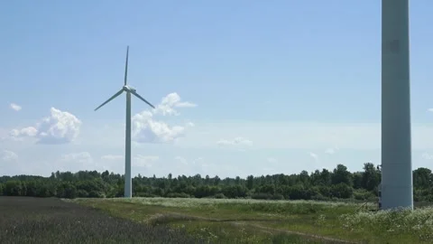 Large wind turbines in the field Stock Footage 155271130