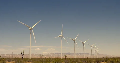 Large wind turbines at Tehachapi wind farm in Mojave Desert 4K Stock Footage 64281558
