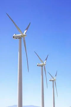 Large windmill in a clear blue sky. Sky background. Stock Photos