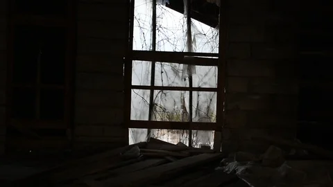 Large window of an abandoned house, interior Stock Footage 123110788
