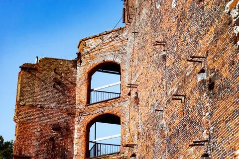Large windows in an old red brick building Foto stock