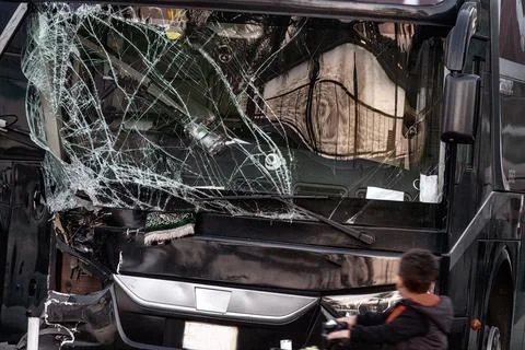 Large windshield of the bus was shattered Stock Photos