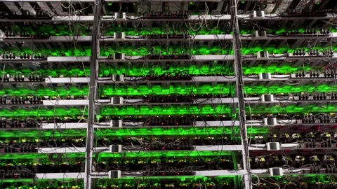 Large wired internet datacenter storage. Cryptocurrency mining equipment on Stock Footage 126690941