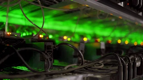 Large wired internet datacenter storage. Cryptocurrency mining equipment on Stock Footage 126690989