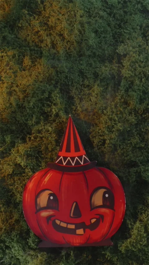 Large witch hat pumpkin in red light smoke background Stock Footage 342423304